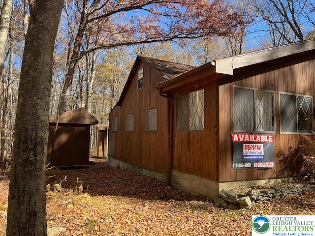 119 Little Mud Pond Road Dingmans Ferry, PA 18328 - Photo 2 of 23 a sign on the side of a building