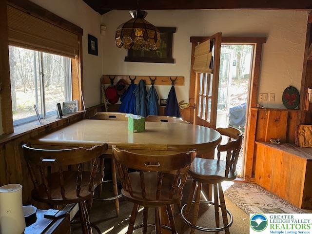 119 Little Mud Pond Road Dingmans Ferry, PA 18328 - Photo 6 of 23 a view of a dining room with furniture and window