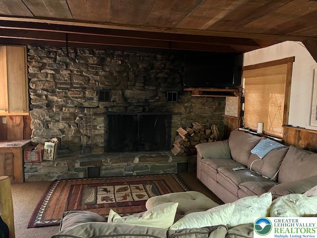 119 Little Mud Pond Road Dingmans Ferry, PA 18328 - Photo 9 of 23 a living room with furniture and a fireplace
