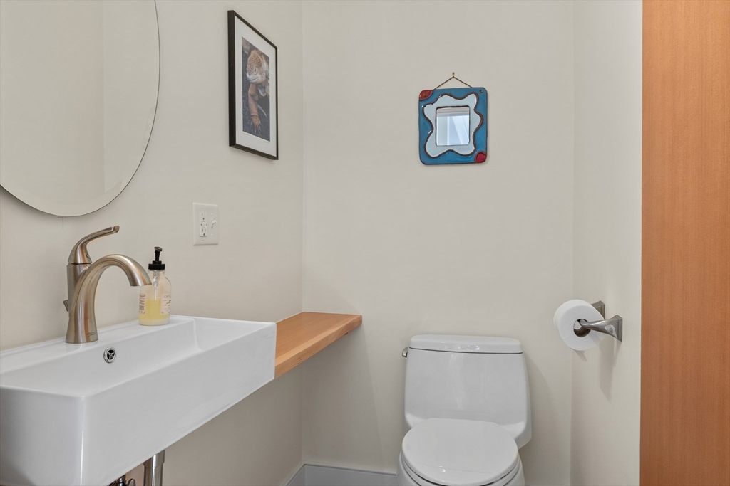 2 Village Street, Unit 2 Somerville, MA 02143 - Photo 8 of 18 a bathroom with a toilet and a sink