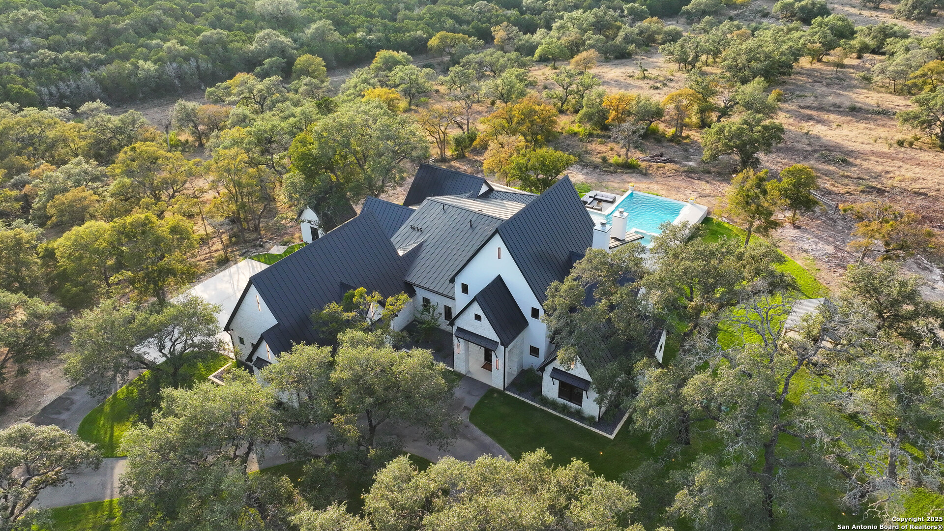 596 Ruger Road Fredericksburg, TX 78624 - Photo 42 of 63 an aerial view of a house with a yard