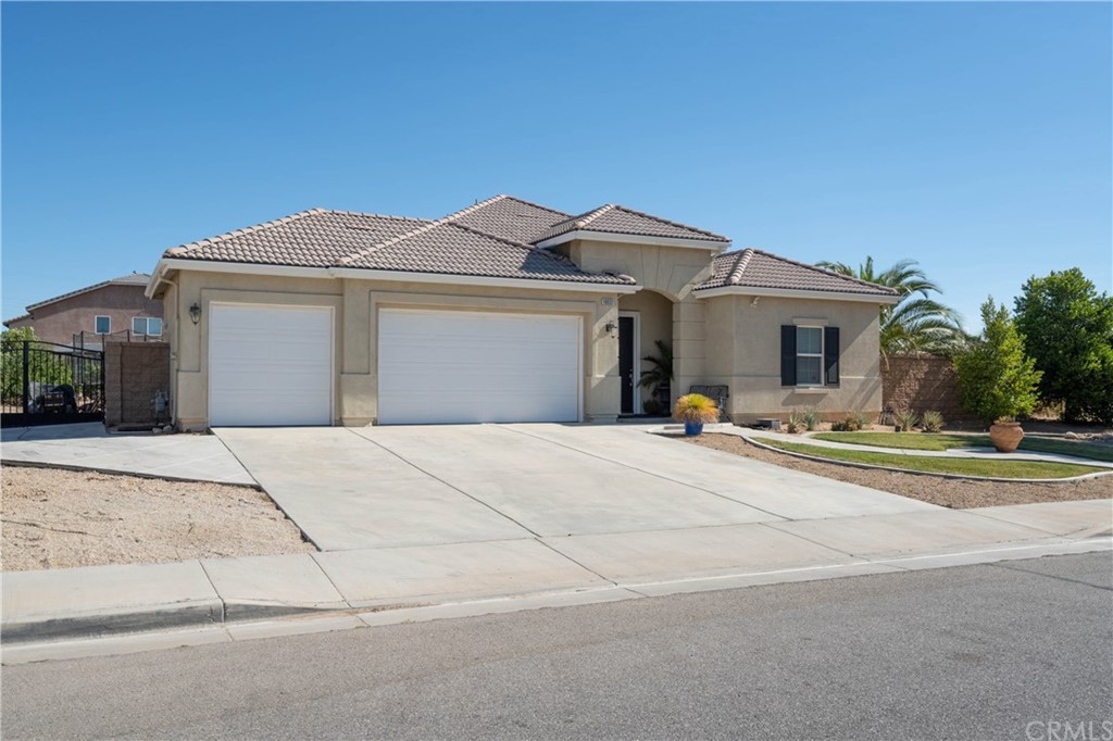 19032 Mono Drive Hesperia, CA 92345 - Photo 11 of 54 a view of a house with a outdoor space