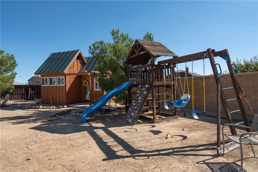 19032 Mono Drive Hesperia, CA 92345 - Photo 20 of 54 a view of a house with backyard