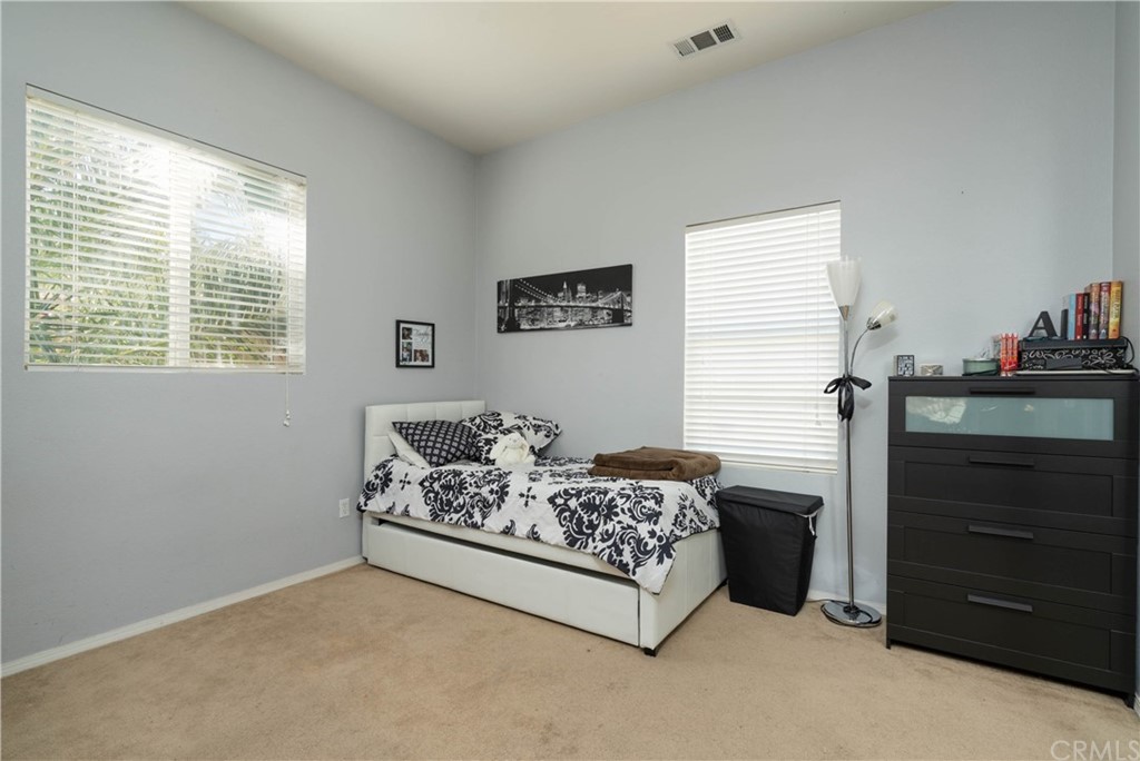 19032 Mono Drive Hesperia, CA 92345 - Photo 27 of 54 a living room with furniture and a window