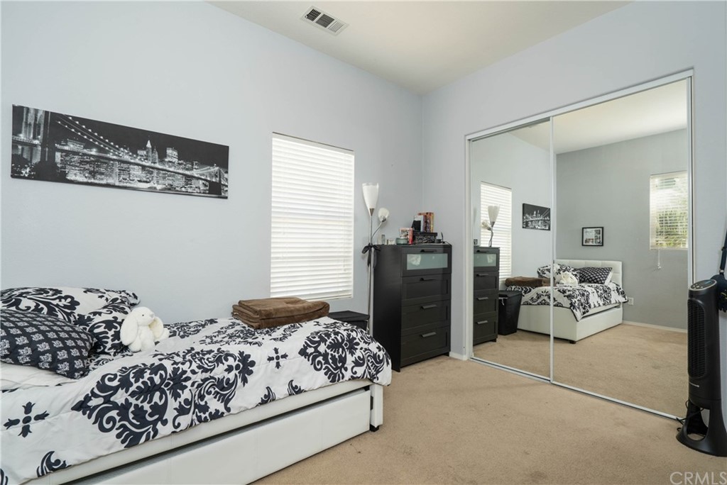 19032 Mono Drive Hesperia, CA 92345 - Photo 28 of 54 a bedroom with bed and window