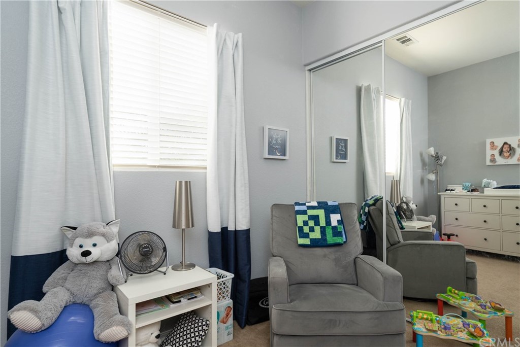 19032 Mono Drive Hesperia, CA 92345 - Photo 31 of 54 a living room with furniture and a window