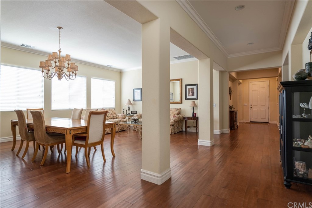19032 Mono Drive Hesperia, CA 92345 - Photo 35 of 54 a view of a dining room with furniture and wooden floor
