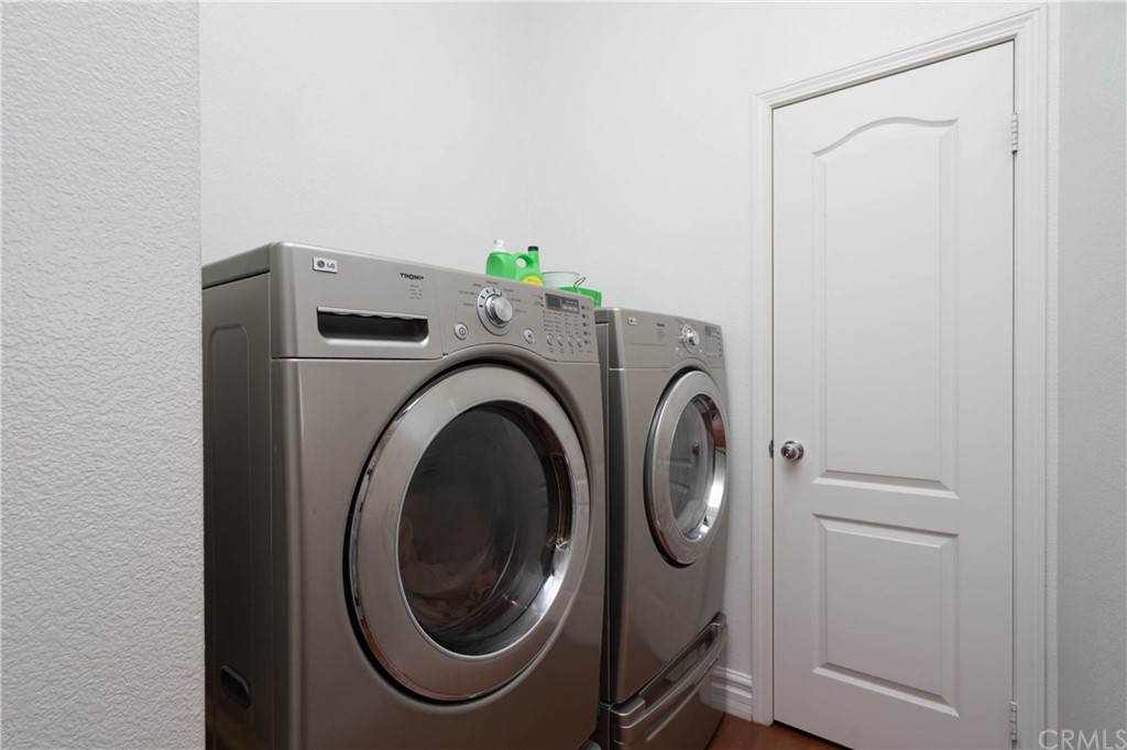 19032 Mono Drive Hesperia, CA 92345 - Photo 43 of 54 a utility room with dryer and washer