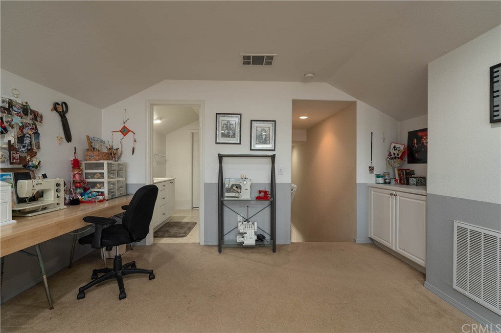 19032 Mono Drive Hesperia, CA 92345 - Photo 46 of 54 a view of a workspace with furniture and a livingroom