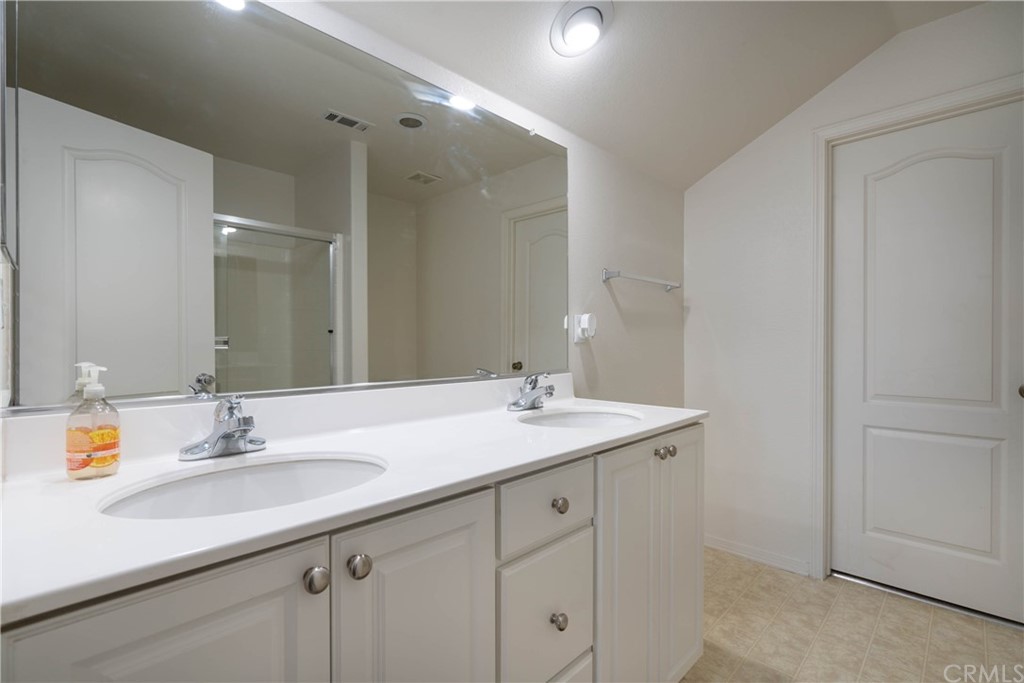 19032 Mono Drive Hesperia, CA 92345 - Photo 47 of 54 a bathroom with a sink and a mirror