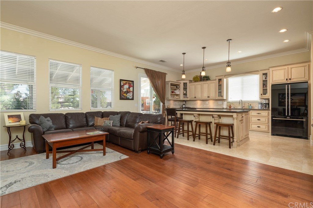 19032 Mono Drive Hesperia, CA 92345 - Photo 49 of 54 a living room with furniture and kitchen view