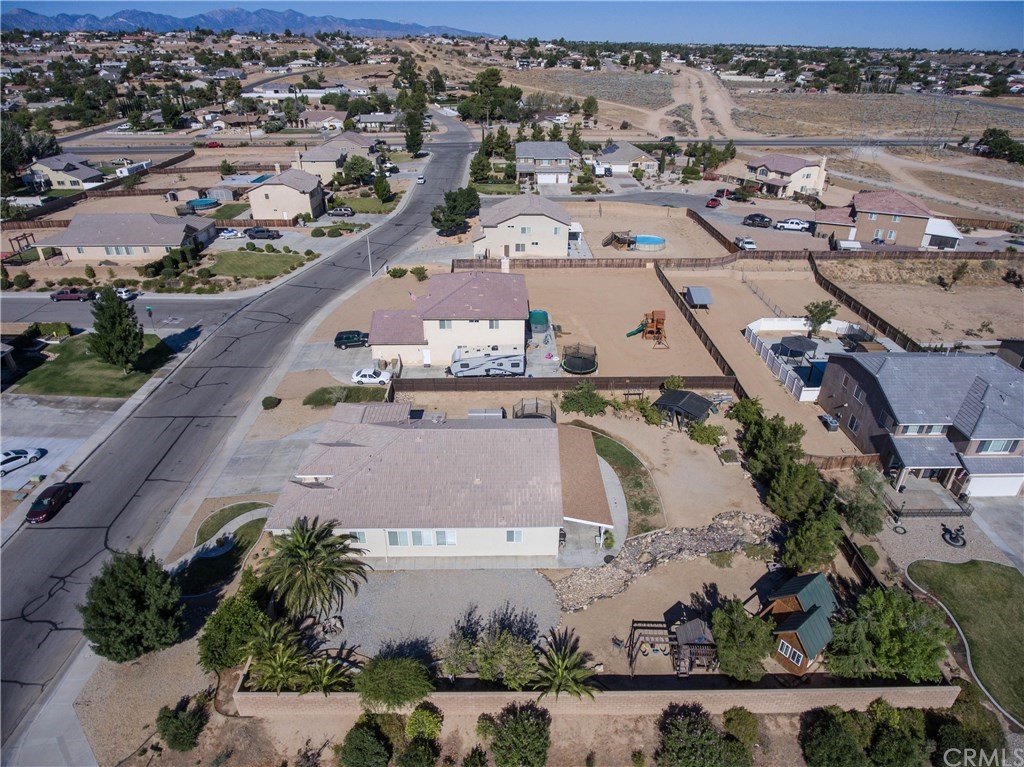 19032 Mono Drive Hesperia, CA 92345 - Photo 5 of 54 an aerial view of a city
