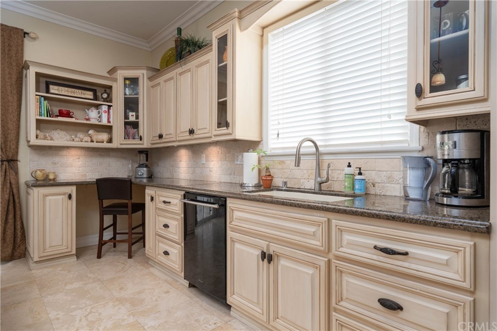 19032 Mono Drive Hesperia, CA 92345 - Photo 52 of 54 a kitchen with stainless steel appliances granite countertop a sink and cabinets
