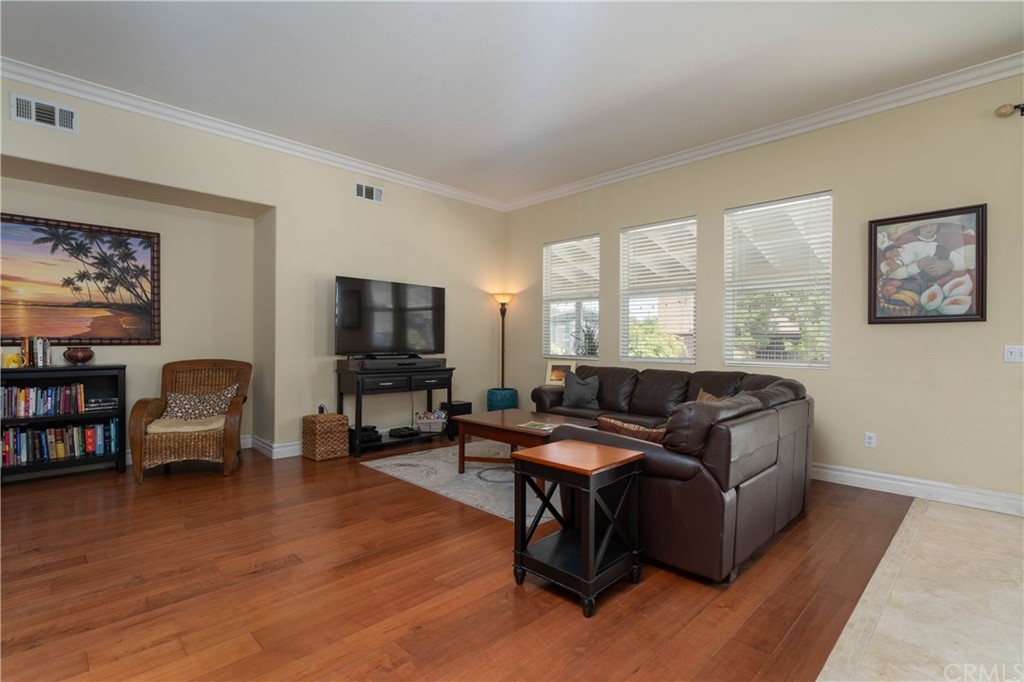 19032 Mono Drive Hesperia, CA 92345 - Photo 54 of 54 a living room with furniture and a flat screen tv