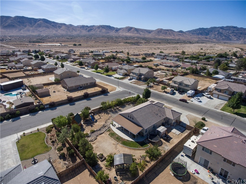 19032 Mono Drive Hesperia, CA 92345 - Photo 8 of 54 an aerial view of residential houses and outdoor space