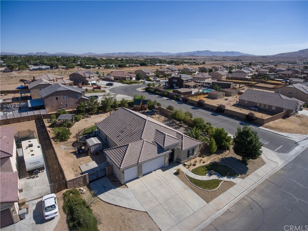 19032 Mono Drive Hesperia, CA 92345 - Photo 10 of 54 an aerial view of residential houses with outdoor space