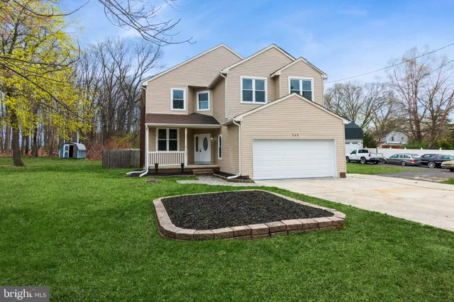 a view of outdoor space yard and front view of a house