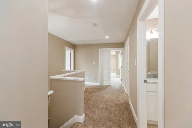 a view of a hallway and closet area