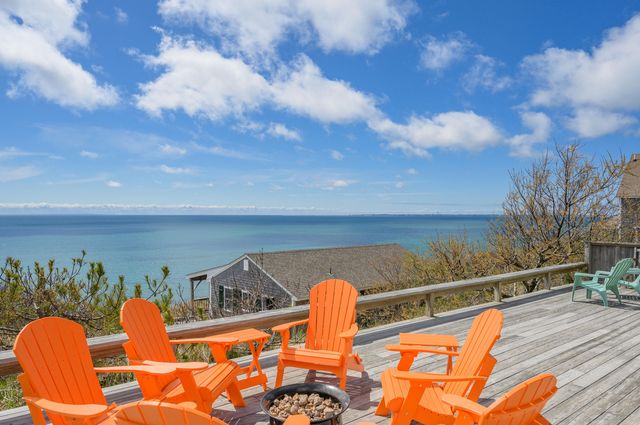 a view of an ocean and a yard