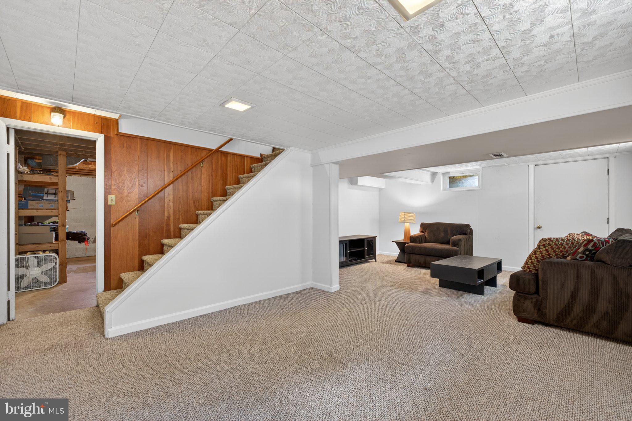 1002 Wilson Place Frederick, MD 21702 - Photo 22 of 30 a living room with furniture and a ceiling fan