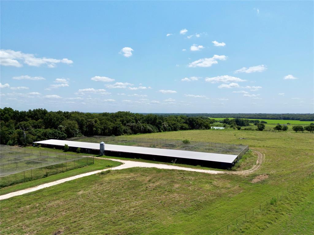 1500 Lumkins Road Forreston, TX 76041 - Photo 13 of 14 a view of a lake with houses