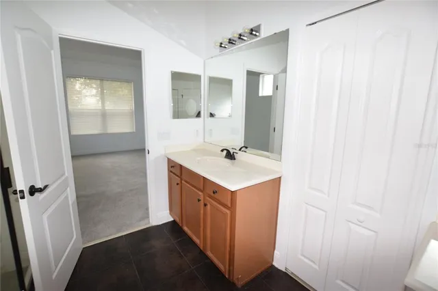 a white bath tub sitting next to a window