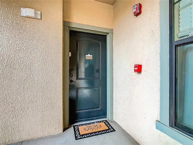 $210,000 | 907 Charo Parkway, Unit 911, Davenport, FL 33897