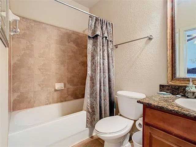 $210,000 | 907 Charo Parkway, Unit 911, Davenport, FL 33897