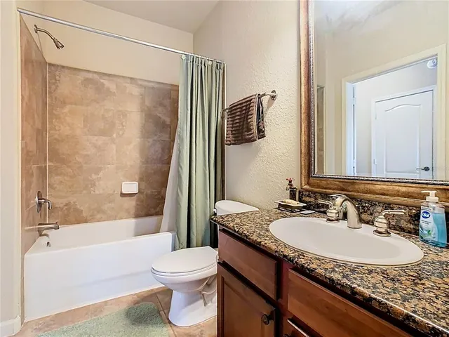 $210,000 | 907 Charo Parkway, Unit 911, Davenport, FL 33897