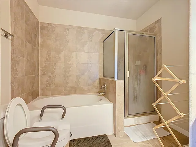 $210,000 | 907 Charo Parkway, Unit 911, Davenport, FL 33897