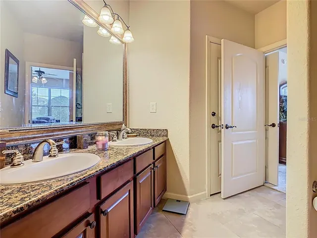 $210,000 | 907 Charo Parkway, Unit 911, Davenport, FL 33897