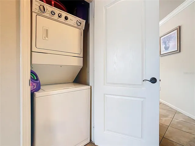 $210,000 | 907 Charo Parkway, Unit 911, Davenport, FL 33897