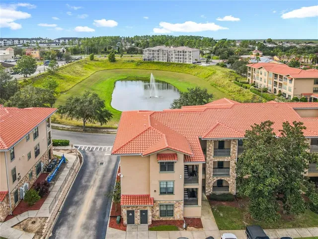 $210,000 | 907 Charo Parkway, Unit 911, Davenport, FL 33897