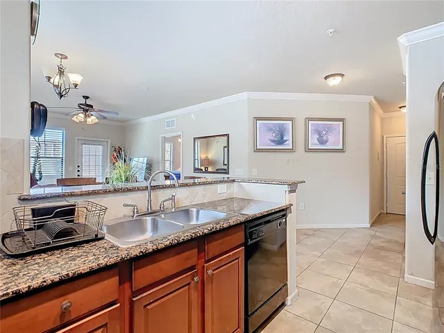 $210,000 | 907 Charo Parkway, Unit 911, Davenport, FL 33897