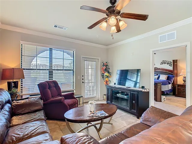 $210,000 | 907 Charo Parkway, Unit 911, Davenport, FL 33897