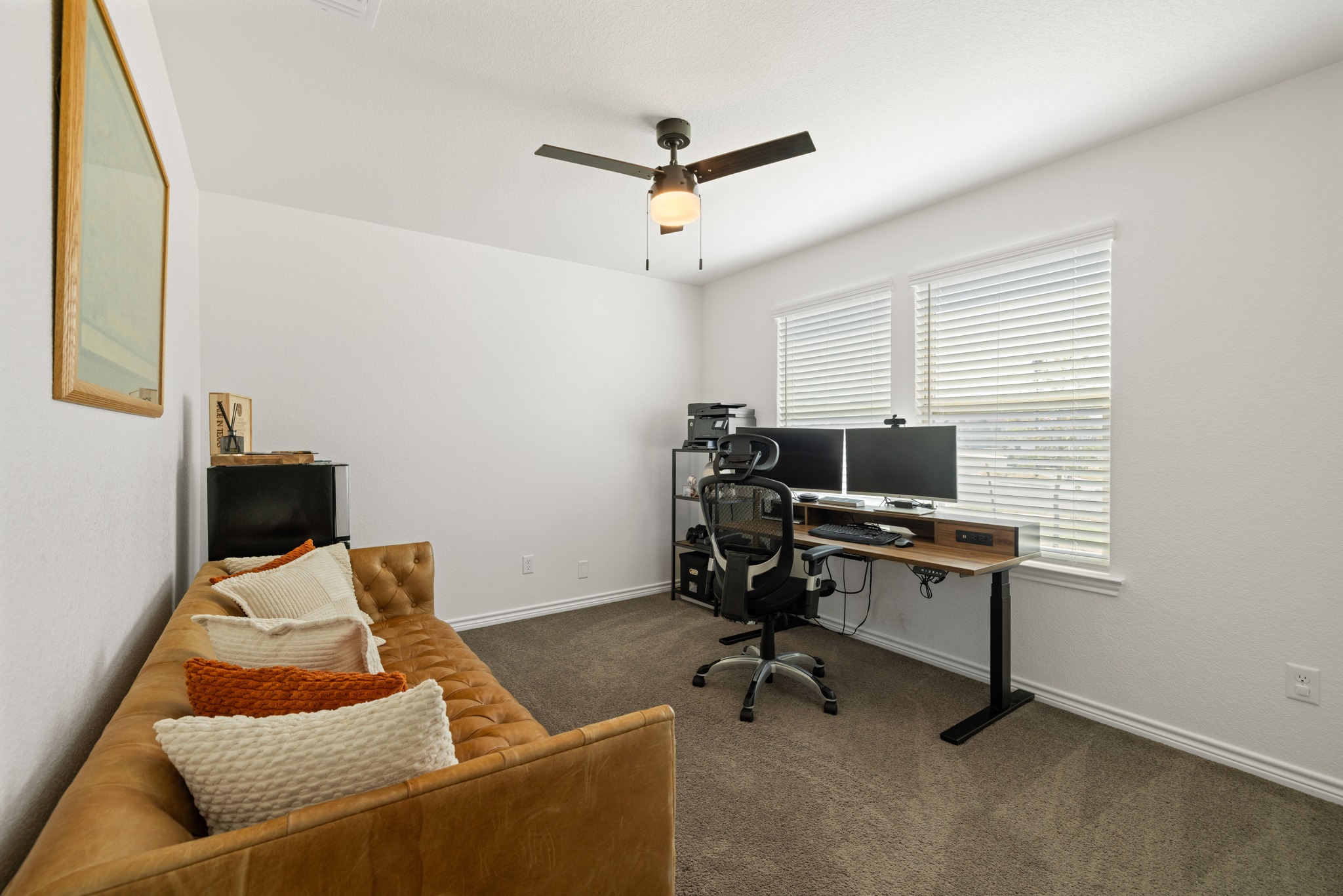 129 Maybelline Road Jarrell, TX 76537 - Photo 20 of 28 Crisp walls and plush carpeting frame this versatile workspace featuring wide double windows.
