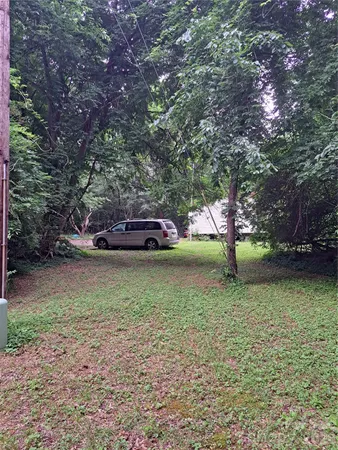 a house with trees in front of it