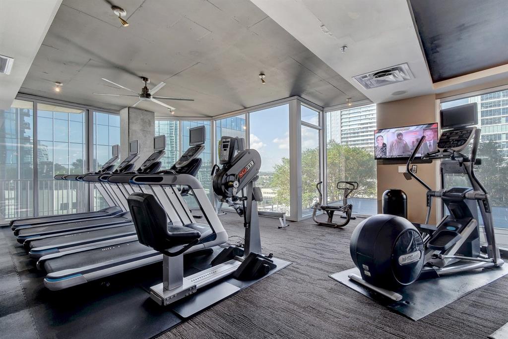 360 Nueces Street, Unit 2004 Austin, TX 78701 - Photo 11 of 34 a view of a room with gym equipment
