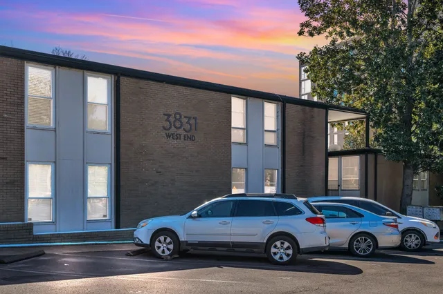 a car parked in front of a building