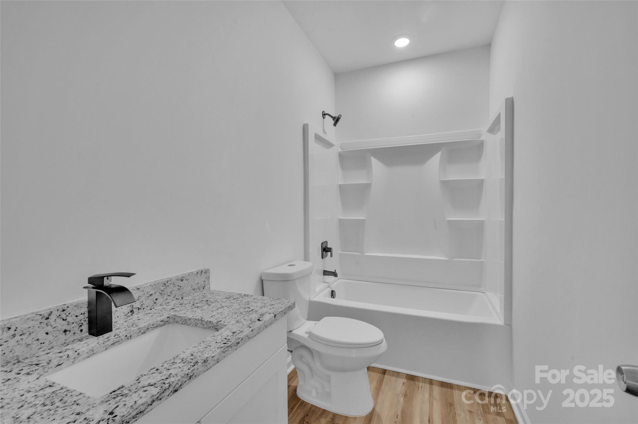 504 Christopher Lane Chester, SC 29706 - Photo 13 of 18 a bathroom with a granite countertop sink toilet and shower