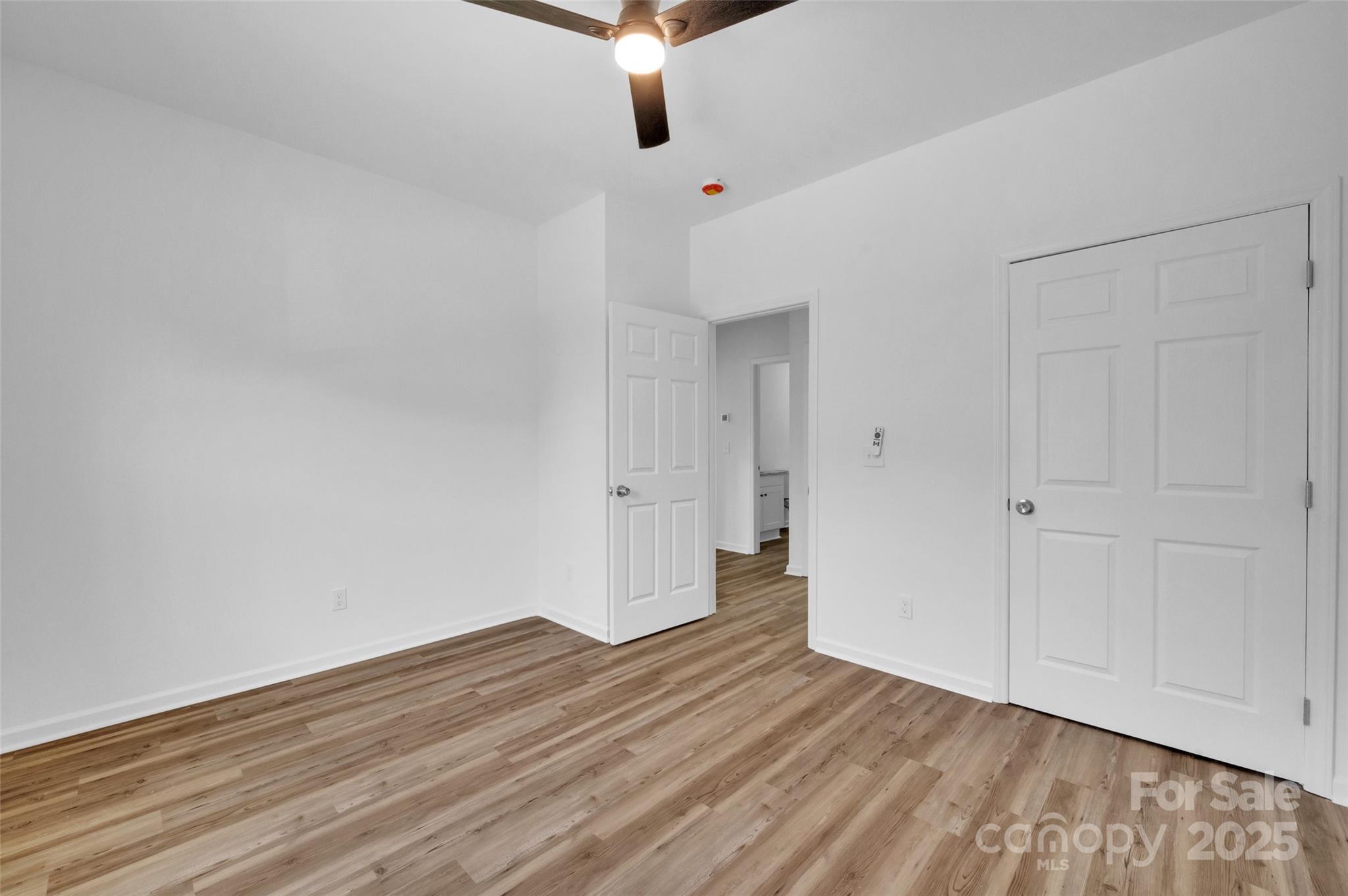 504 Christopher Lane Chester, SC 29706 - Photo 17 of 18 a view of an empty room with wooden floor