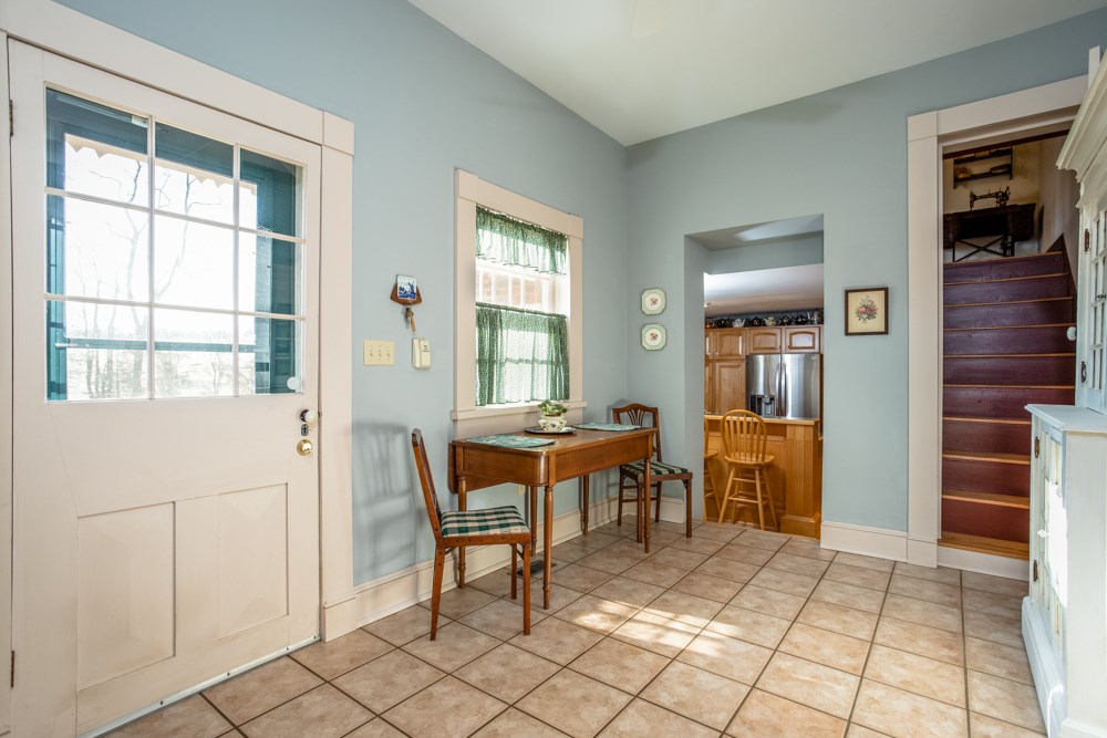 568 Whetstone Draft Road Mount Solon, VA 22843 - Photo 14 of 49 a dining room with a table and chairs