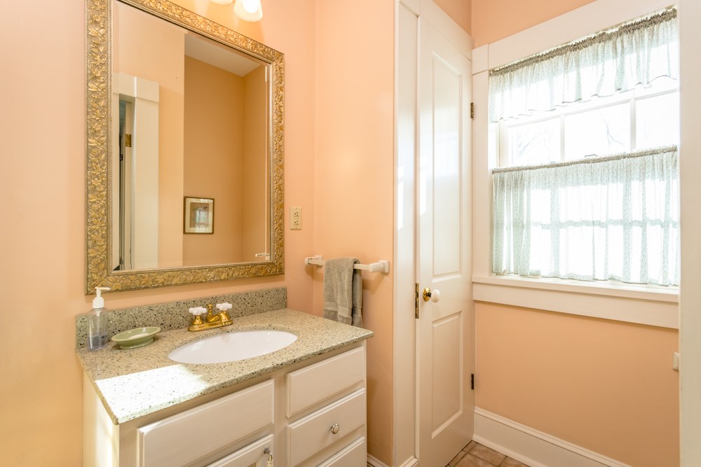568 Whetstone Draft Road Mount Solon, VA 22843 - Photo 23 of 49 a bathroom with a sink and a mirror