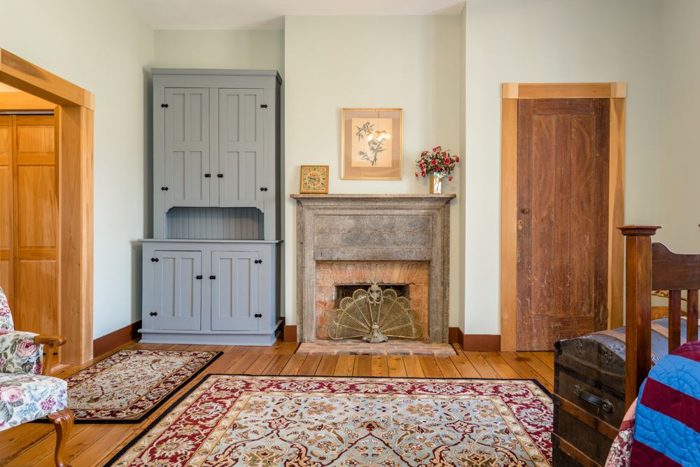 568 Whetstone Draft Road Mount Solon, VA 22843 - Photo 24 of 49 a living room with furniture and a fireplace