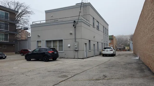a car parked in front of a building