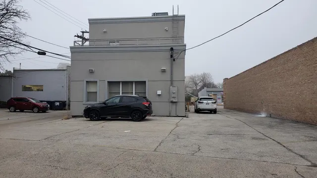 a car parked in front of a building