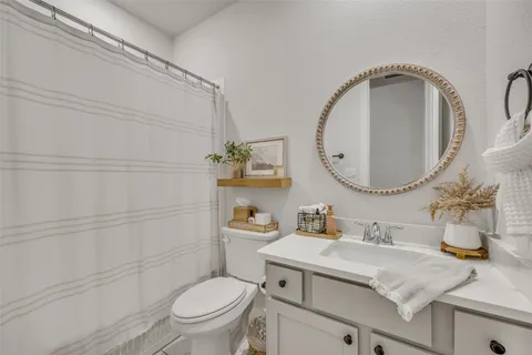 a bedroom with a bed furniture and a window
