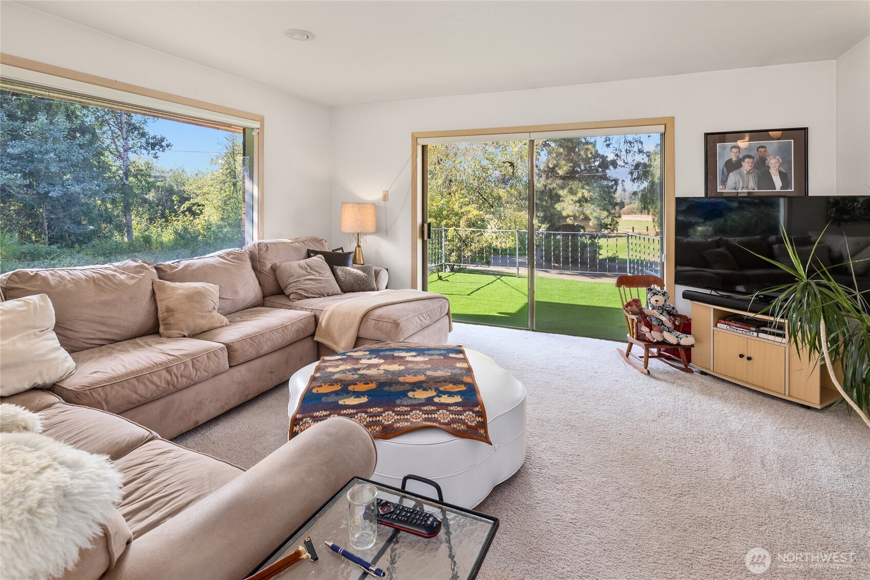911 Westside Road Cle Elum, WA 98922 - Photo 11 of 40 a living room with furniture and a flat screen tv