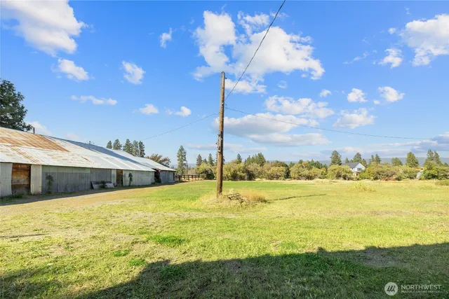 a house with swimming pool in front of it