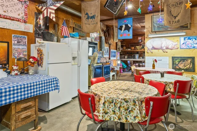 a view of outdoor space with table and chairs